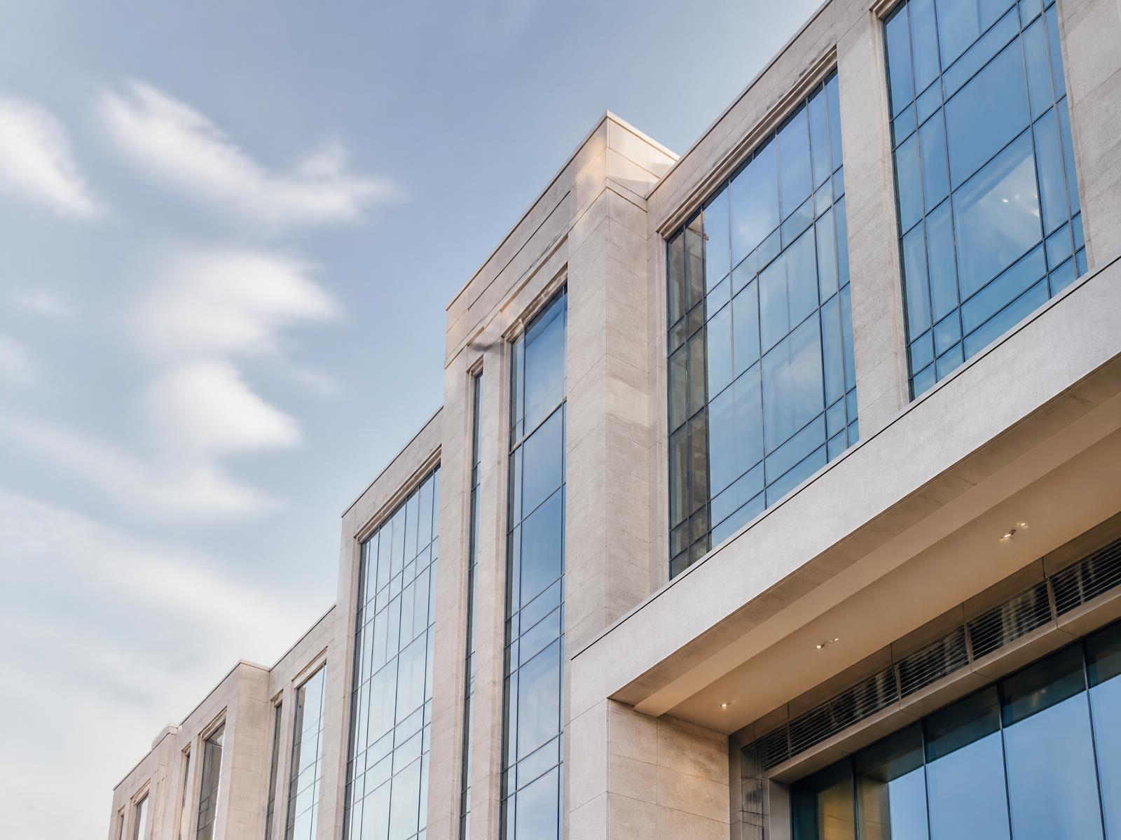 Modern corporate office building facade in bright daylight